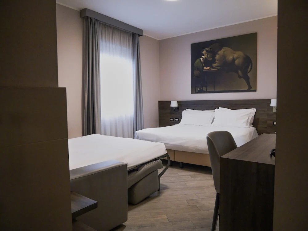 Foto di una camera family dell'hotel guerro